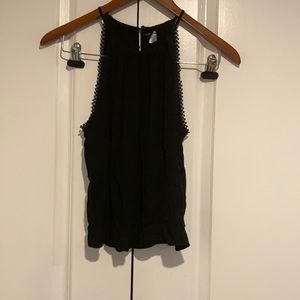 Divided black halter blouse